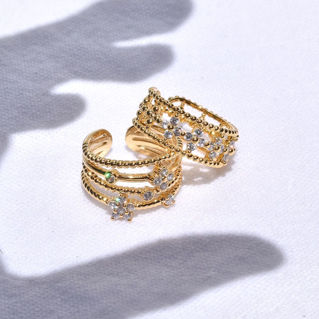 Gold Plated Sparkle Cubic Zirconia Four Lines Cuff.
This cuff is designed to add a touch of elegance and sparkle to any outfit.
Embrace the beauty of cubic zirconia and shine bright with this stunning accessory.

Material: 16K Gold Plated, Brass, Water Resistant
Size: Adjustable