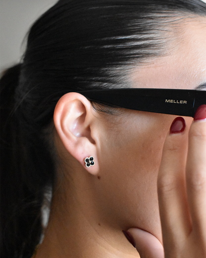 Close shot Model shot with Korean style black cubic clover earrings.