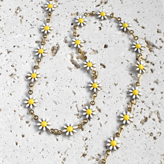 Stainless steel full daisy flower necklace on white stone background - sunmul jewelry