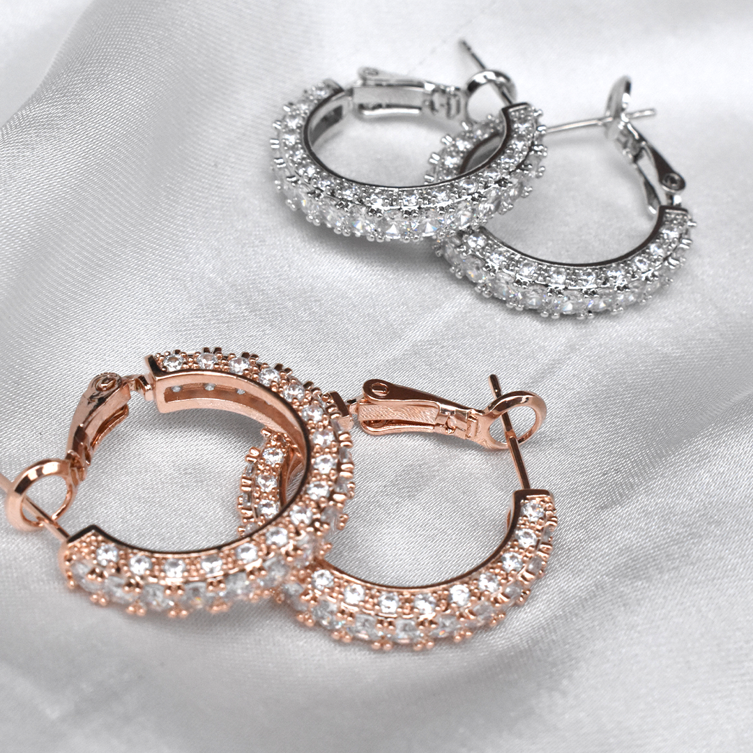 Sparkling diamonte hoop earrings in silver and rose gold finishes, part of the Sunmul Australia collection.